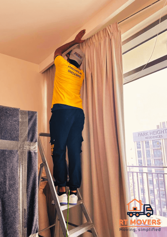 Our team fixing the curtains of the customer