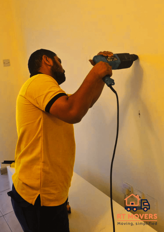 Our professional member installing TV in the wall. (TV's wall installation)